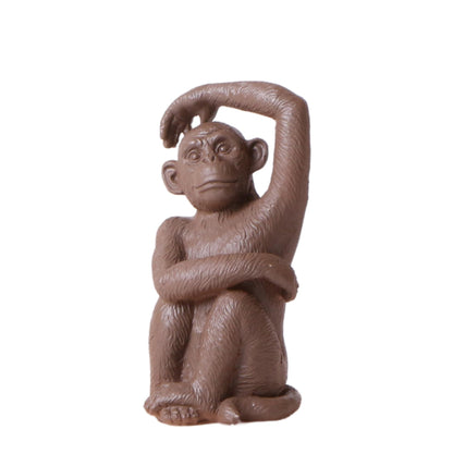 Kolibri-Heim | Ornament – ​​Dekorative Affenfigur – Sitzender Affe – Braun